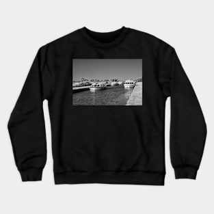 Holiday boats moored along Thurne Dyke, Norfolk Broads Crewneck Sweatshirt